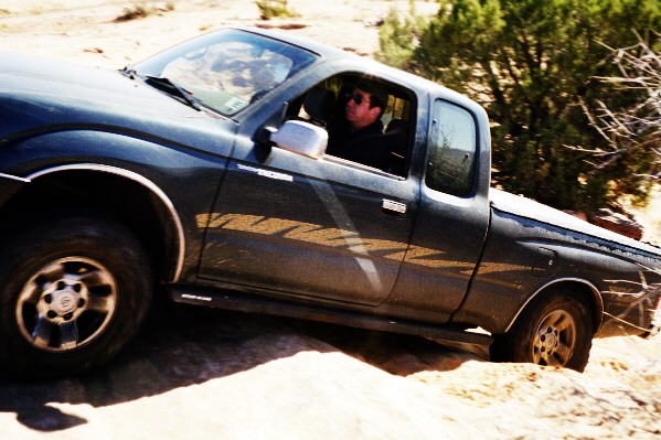 Matt drives his taco up another Poison Spider Moab ledge